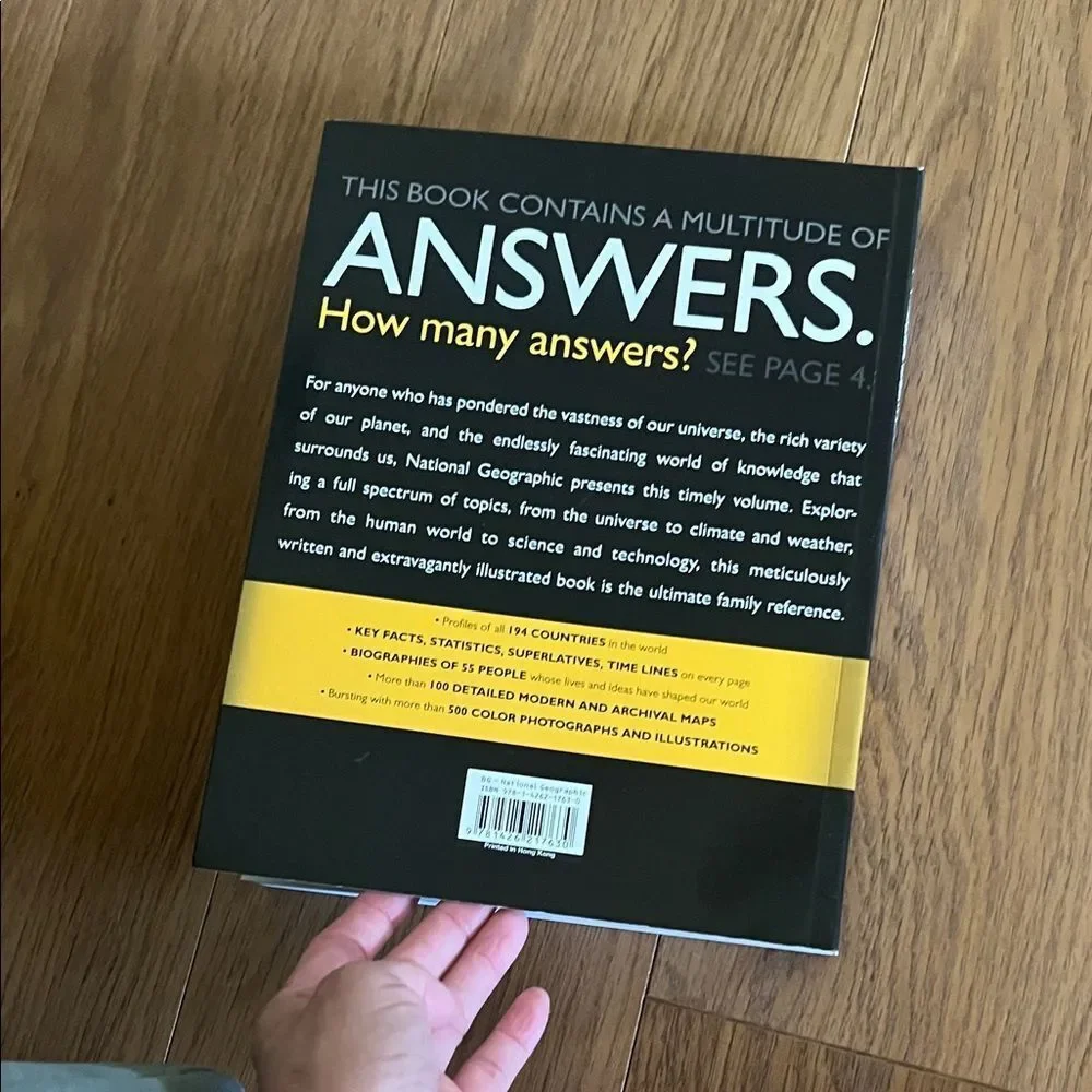 #0990**National Geographic Answer Book with Vibrant Yellow and Blue Cover
